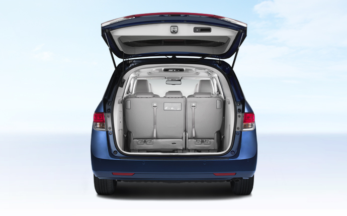 Blue 2014 Honda Odyssey with back hatch open